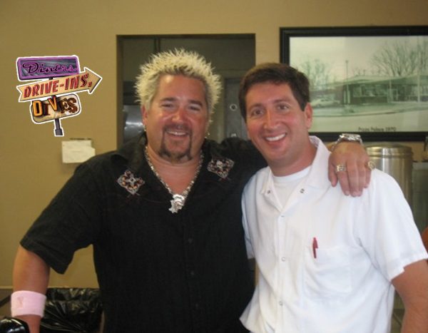 guy fieri with pizza palace owner